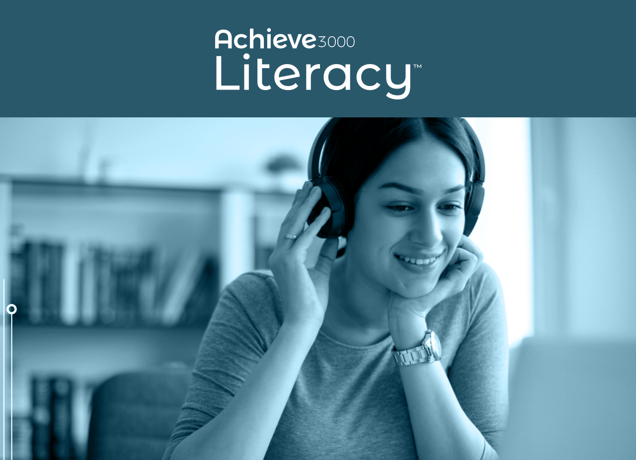 Achieve Literacy. Woman in gray crew neck t-shirt holding black headphones